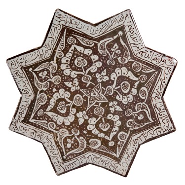 image shows an eight-pointed star-shaped lusterware tile with a metallic sheen on a white background from the Burrell Collection