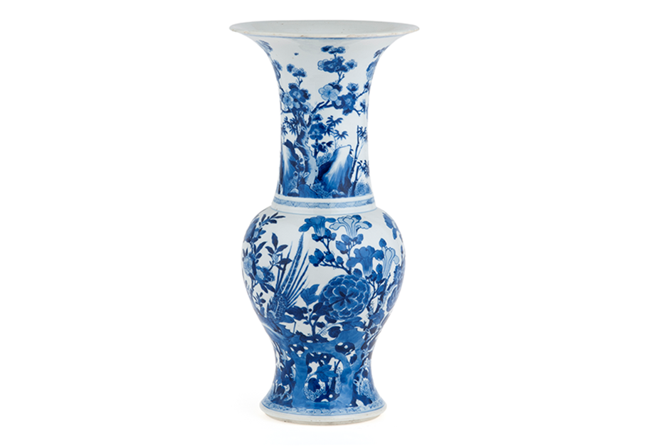 Photograph of a vase with flowers to celebrate spring. The magnolia and peony flowers and prunus (plum blossom) all represent spring in Chinese art.